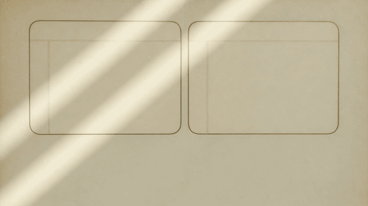 Two blank paper ledgers with window light moving across them